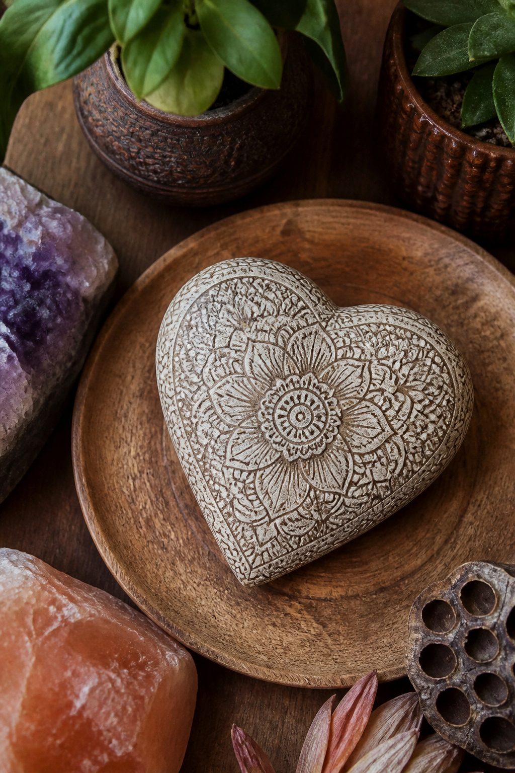 A heart-shaped mandala design showing geometric patterns.