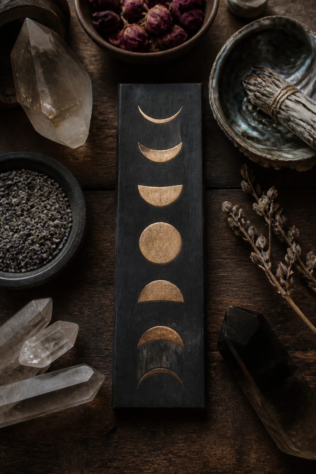Mystical Tattoos: Symbols, Spirits, and Sacred Art 5 A tattoo of moon phases arranged along the spine.